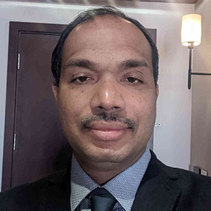 Dr. Manesh Matthews